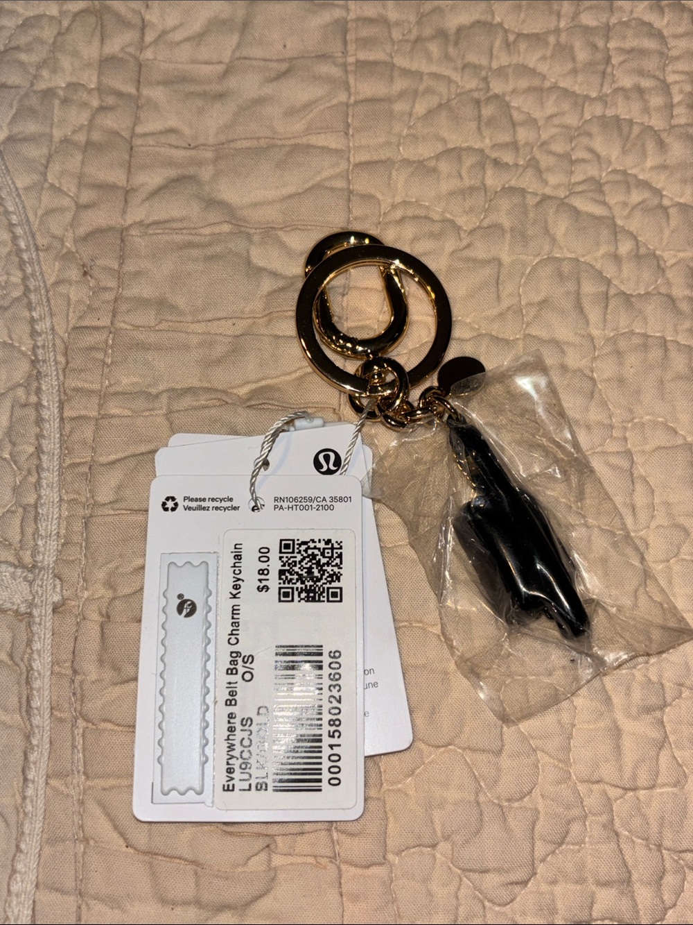 lululemon athletica Black and Gold Keychain Charm